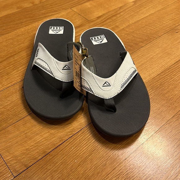 REEF men’s Fanning Low Flip Flop Sandals With Bottle Opener